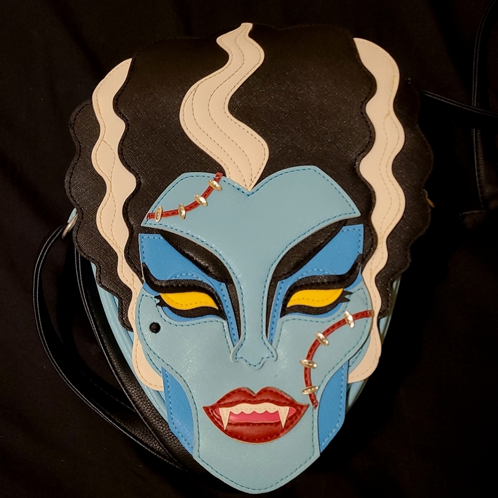 Like new Bride of Frankenstein cross body purse by Micheline Pitt